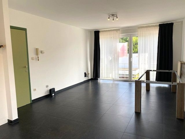 Gelijkvloers 2 slaapkamer appartement met garage in centrum van Geel foto 4