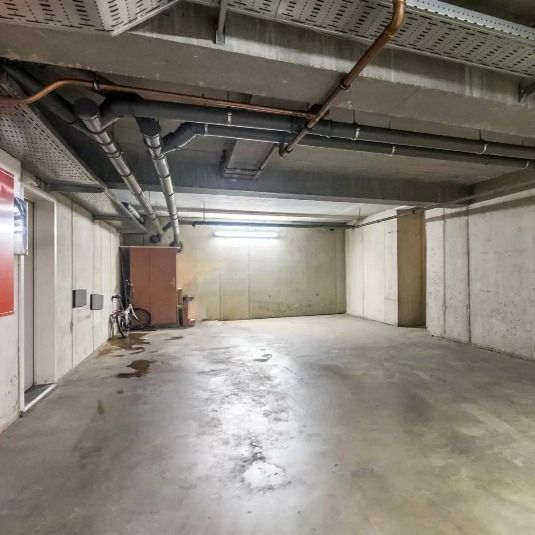 Gelijkvloers casco appartement (+-127m²) op invalsweg Geel centrum met autostaanplaats en terras foto 12