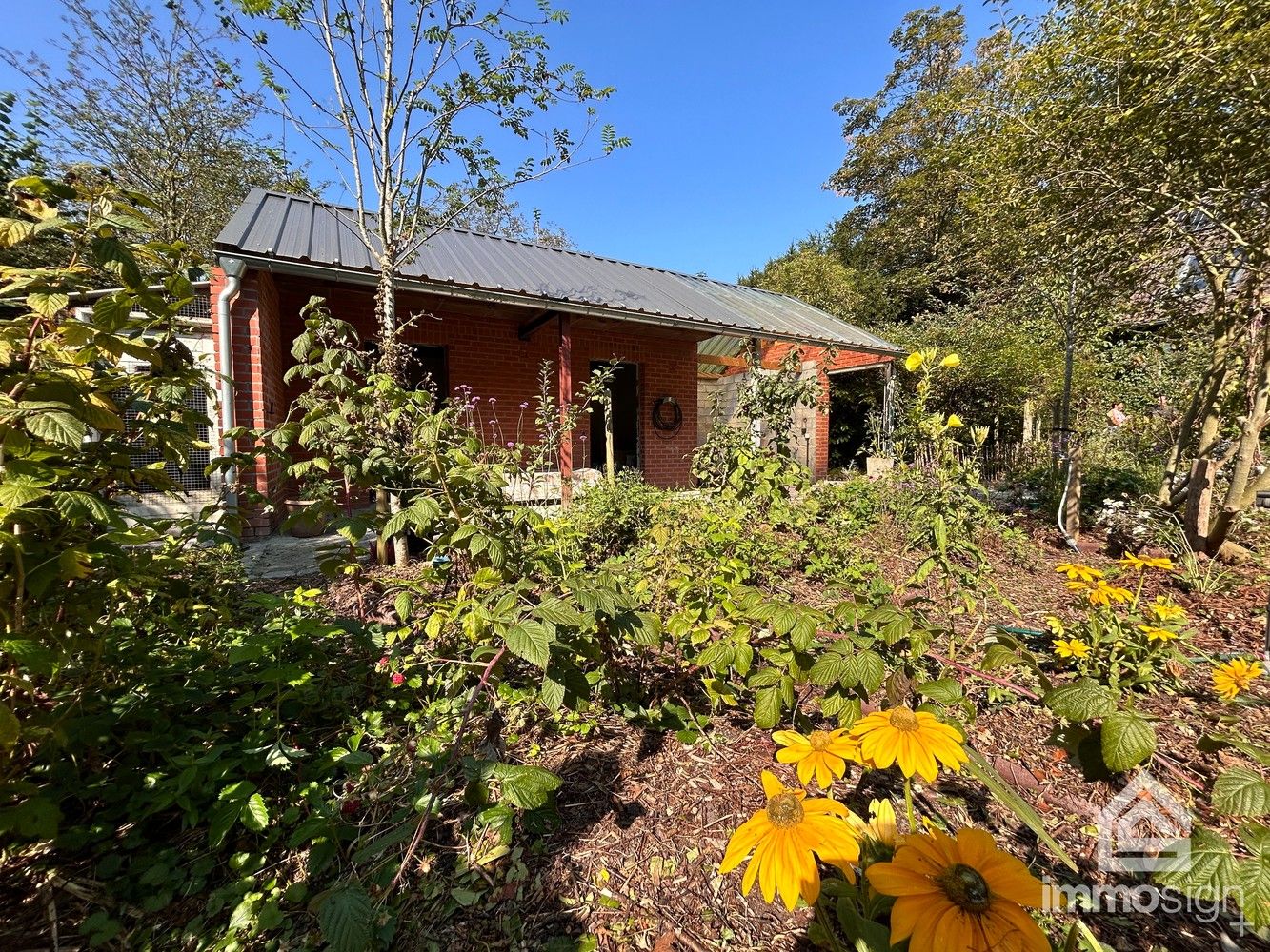 In het groen verscholen, vrijstaand landhuis met prachtige natuurtuin op 2100m² foto 49