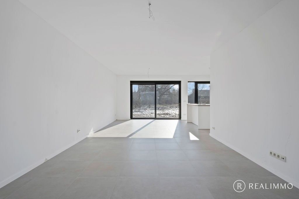 Halfopen nieuwbouwwoning met grote tuin in landelijke stijl in Kerkhove foto 5