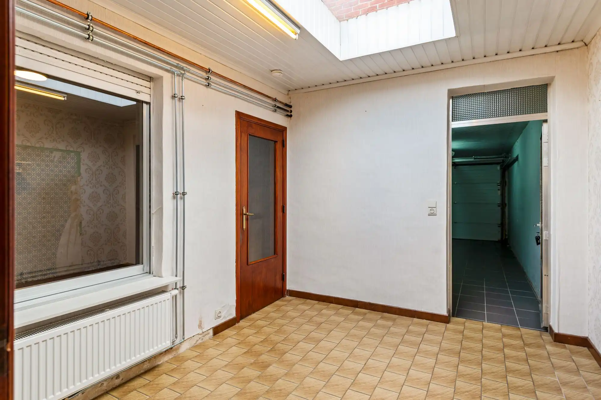 Te renoveren gezinswoning met leuke tuin en 2 garages op topligging in Brasschaat! foto 15