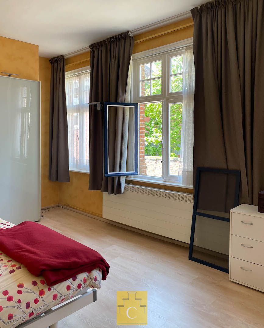 Karakterpand uit de late jaren ‘20 met zongerichte tuinpatio’s en authentiek achterhuis, onbetaalbaar uitzicht op een historische kloostertuin foto 20