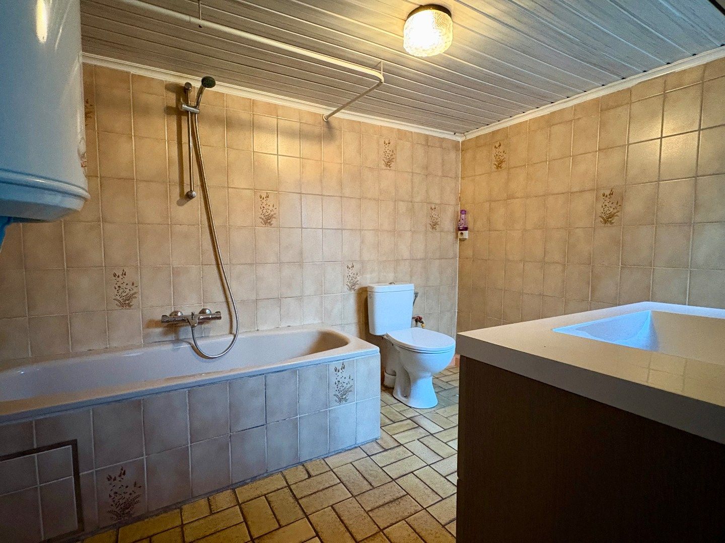 Woning dichtbij centrum Kuurne met parkeerplaats, gezellige tuin. foto 9