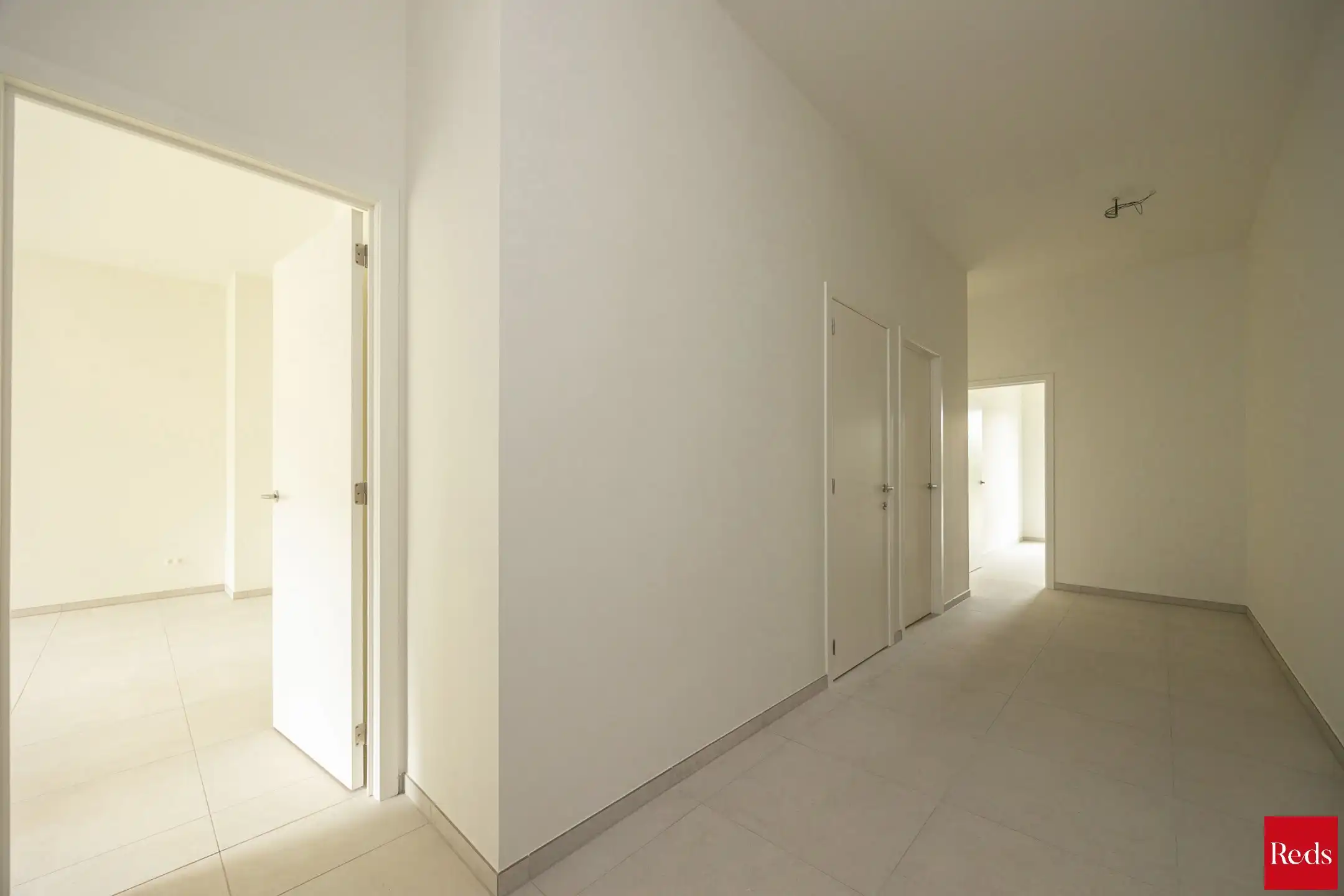 Ruim gelijkvloers nieuwbouwappartement met 3 slaapkamers foto 9