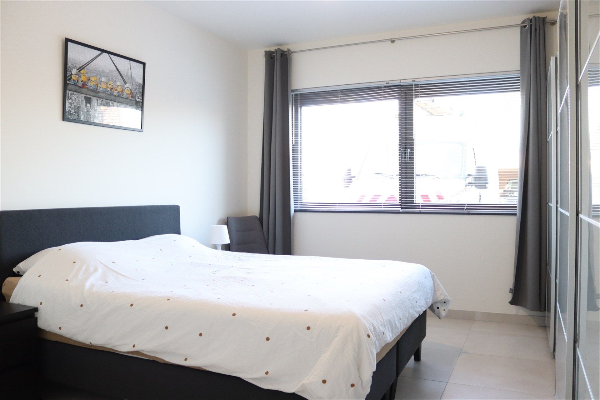 Ruim instapklaar gelijkvloers appartement met terras en caport. foto 10