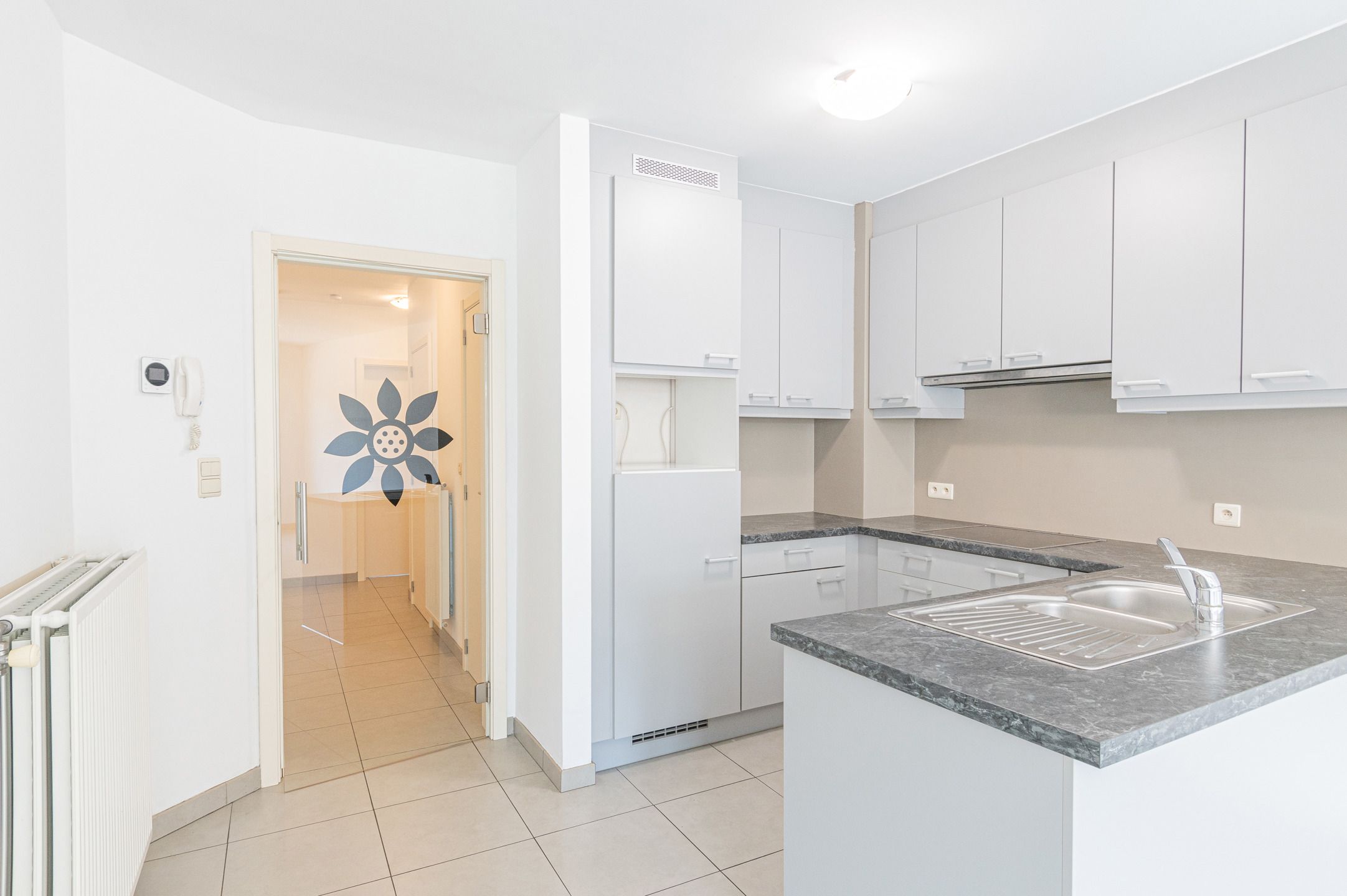 Gelijkvloers appartement met 2 slaapkamers! foto 4