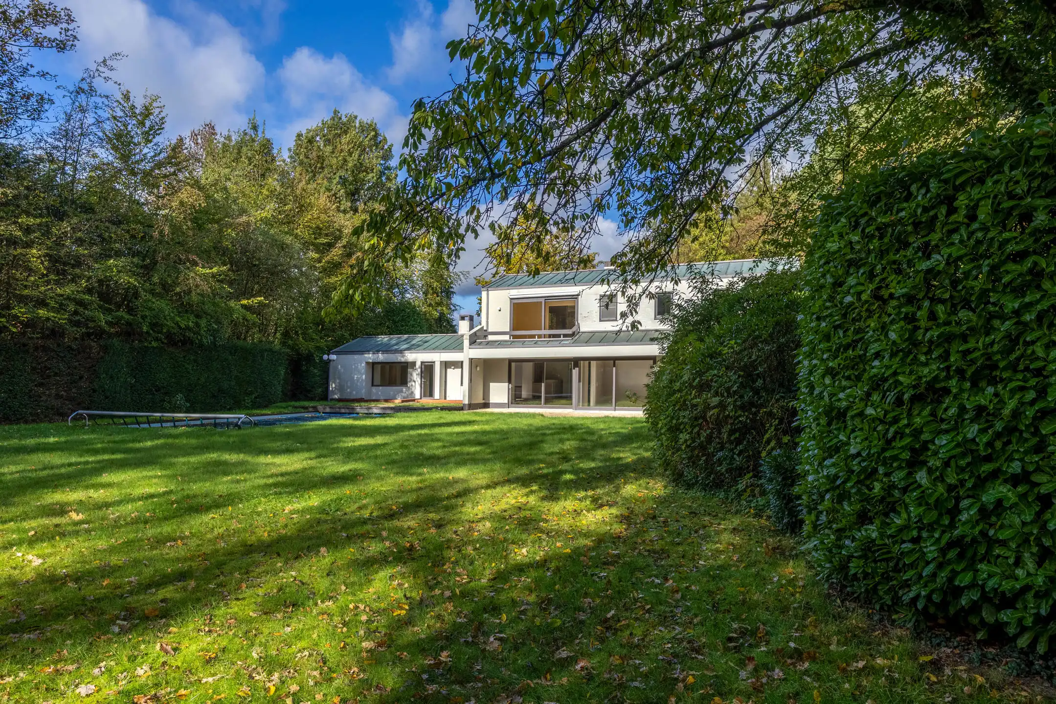 Seventiesvilla met zwembad en wellnessruimte in het groen  foto 25