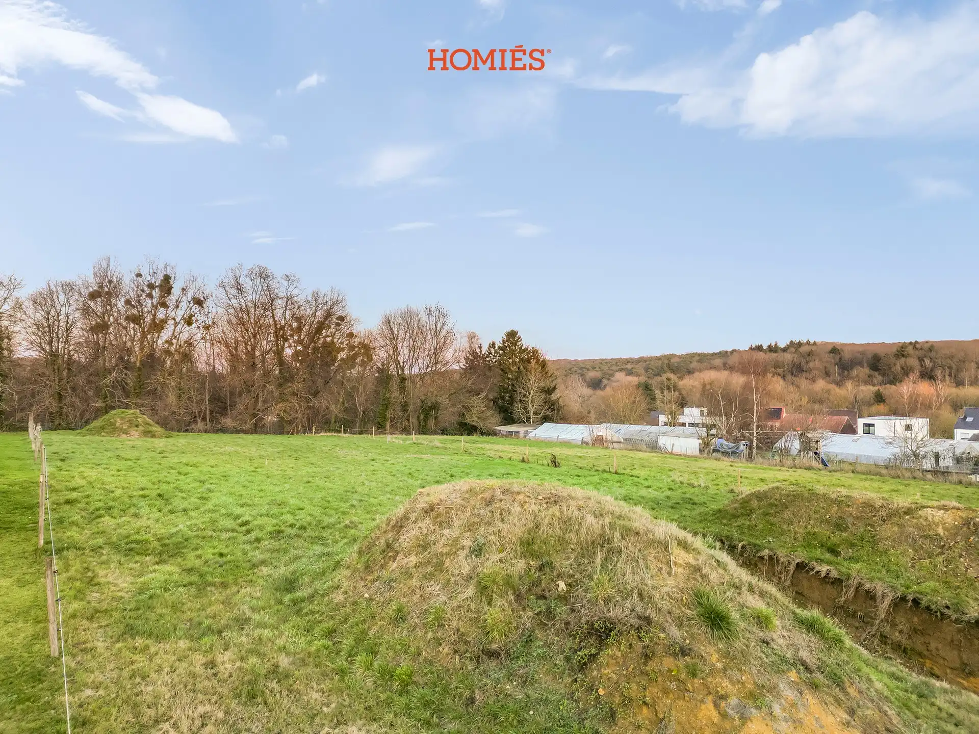 Ruime bouwgrond in groene omgeving foto 4