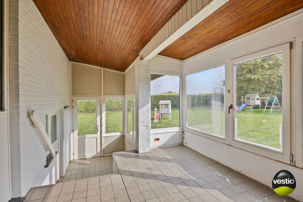 RUSTIG GELEGEN SPLIT LEVEL WONING OP 21A10CA TE KORTESSEM. foto 14