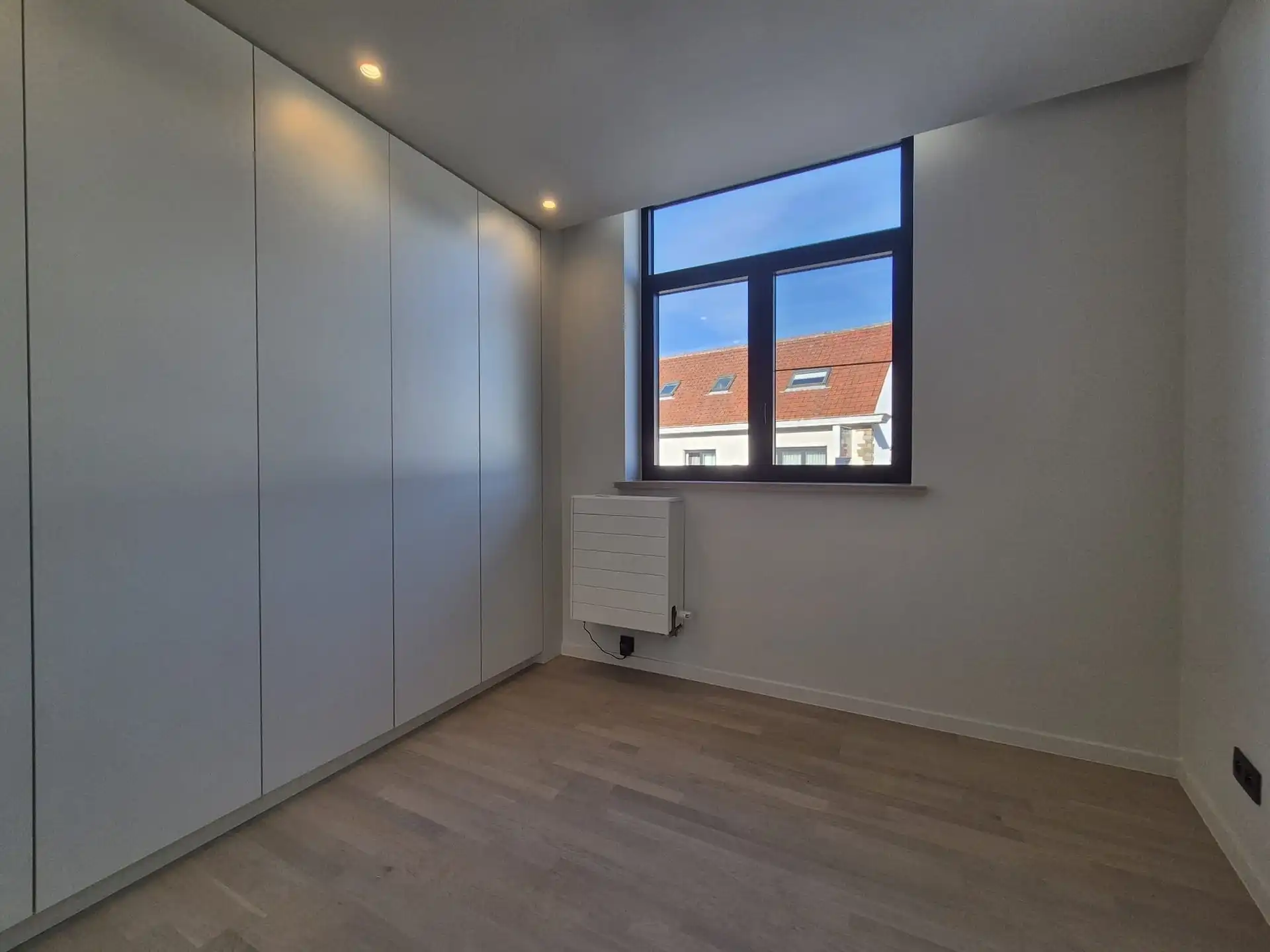 Ruime en luxueus afgewerkte duplex met 4 slaapkamers, terras en tuin. foto 14