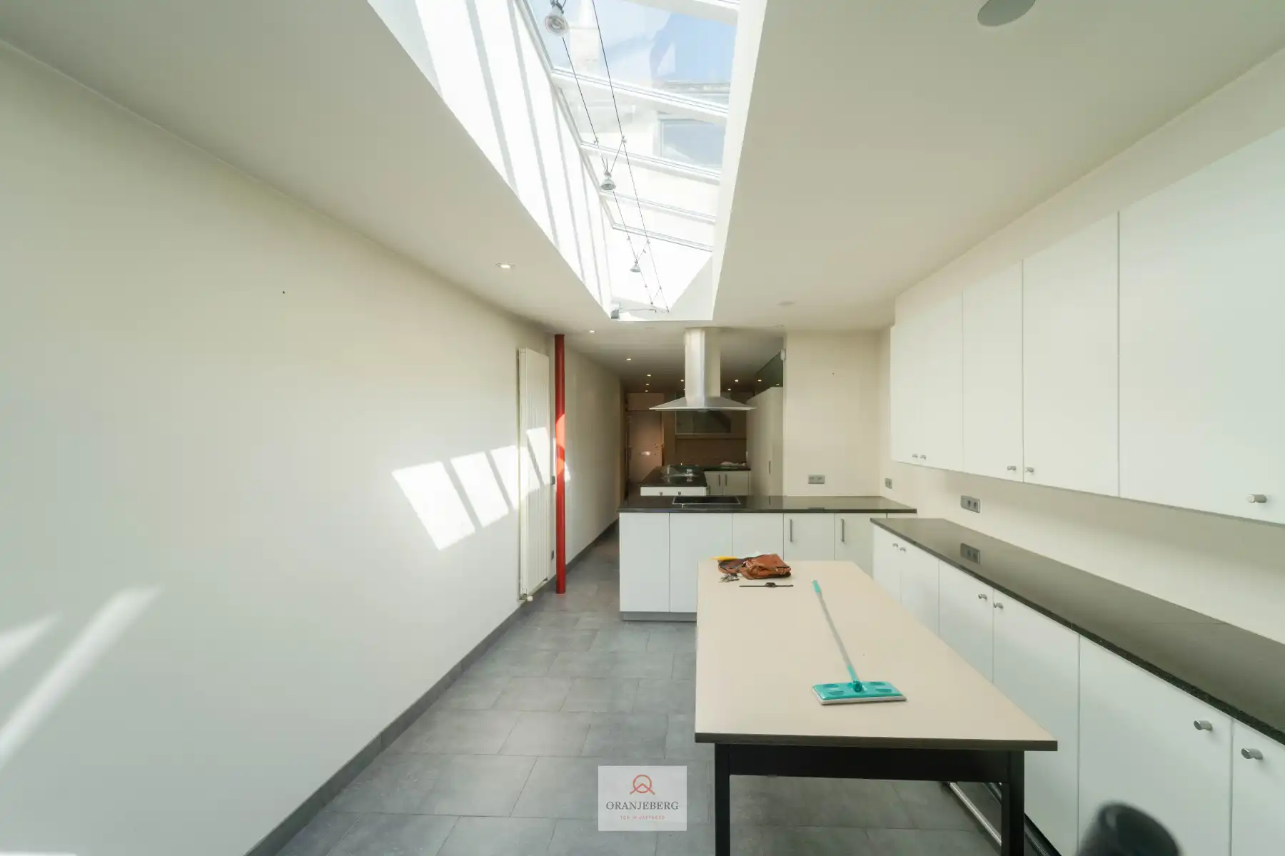 Lichtrijke woning met tuin en ruime garage aan dorpsplein Assenede foto 6