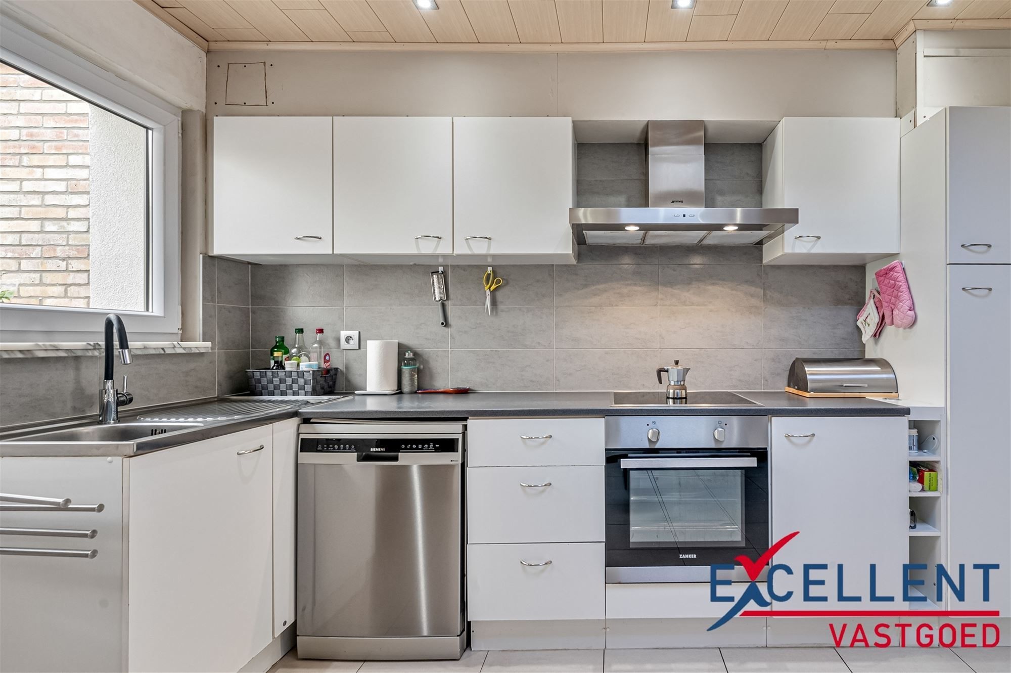 Instapklare en gerenoveerde woning centrum Deinze te koop foto 4