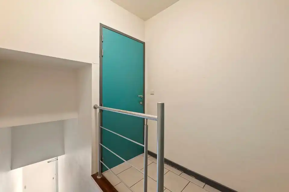 KNAP HANDELSPAND MET TWEE APART VERHUURDE APPARTEMENTEN IN HET CENTRUM VAN SINT-TRUIDEN foto 28