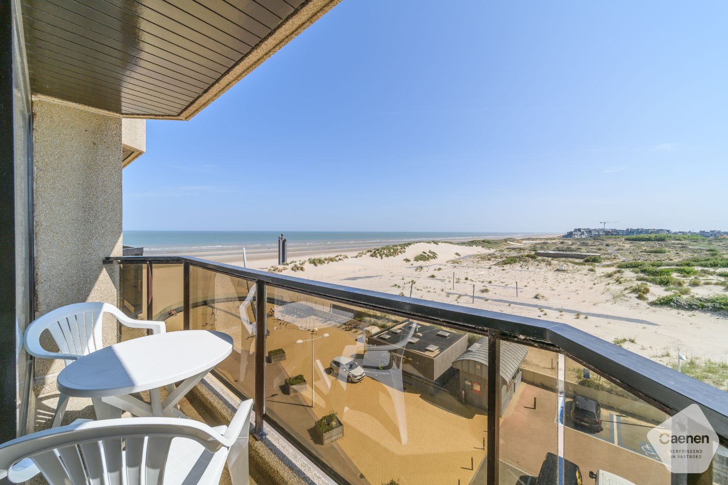 Instapklare, energiezuinige studio met uniek zicht op zee en duinen foto {{pictureIndex}}