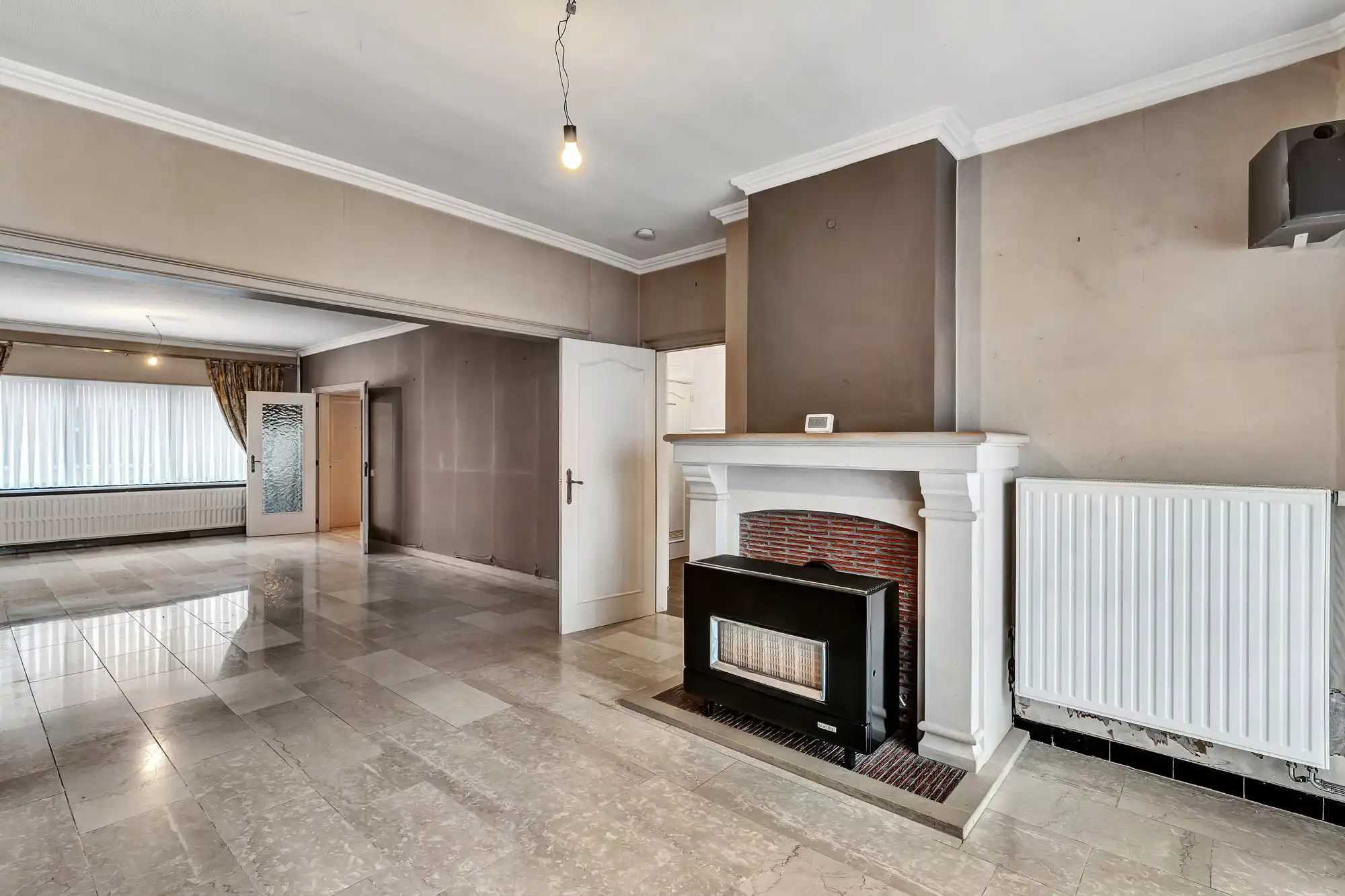 Te moderniseren woning met 3 slaapkamers en garage foto 4