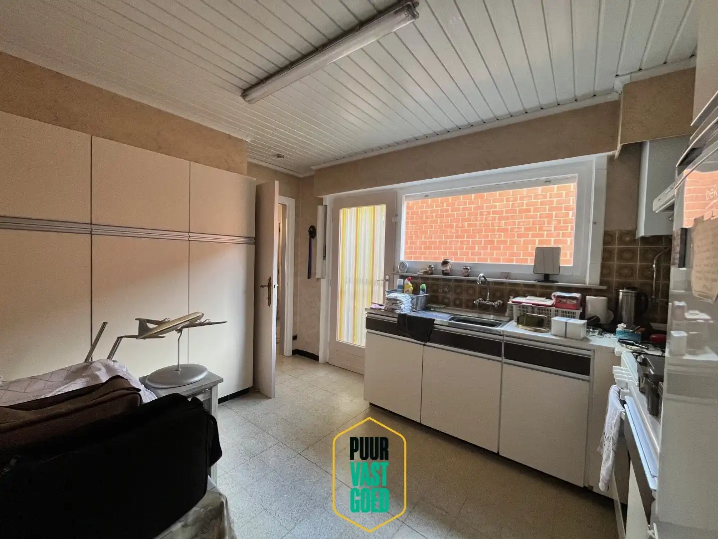 Vlot bereikbare en degelijke woning met tuin, garage en dubbele oprit. foto 9