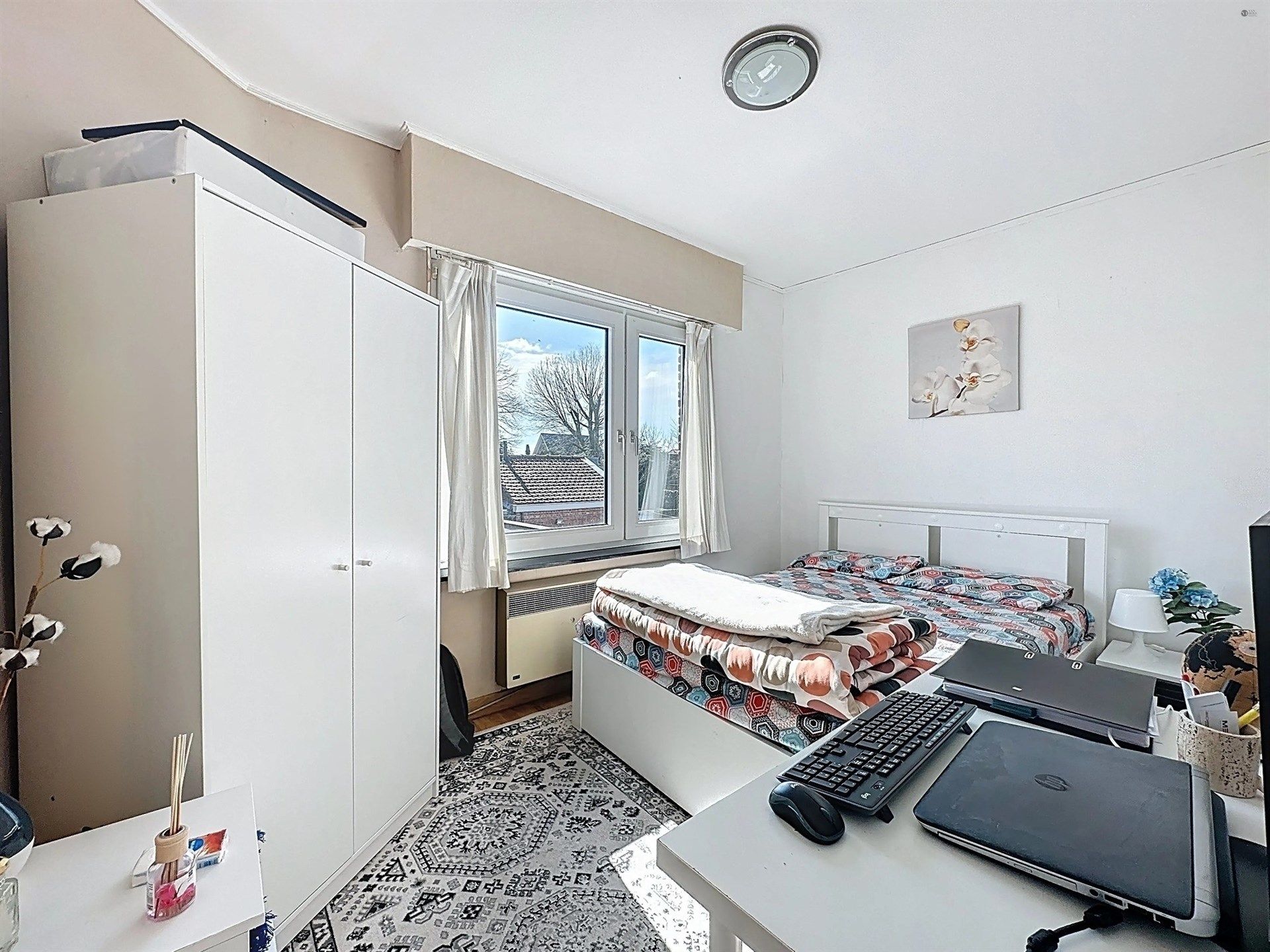 Half open gezinswoning met 4 slaapkamers, 2 badkamers en zonovergoten tuin.  foto 6