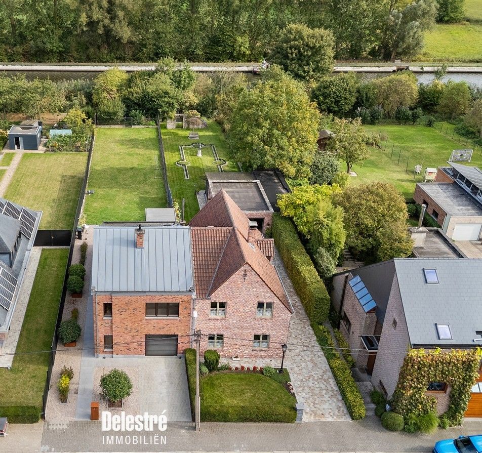 GERENOVEERDE WONING AAN DE DENDER MET ADEMBENEMENDE VERGEZICHTEN foto 3