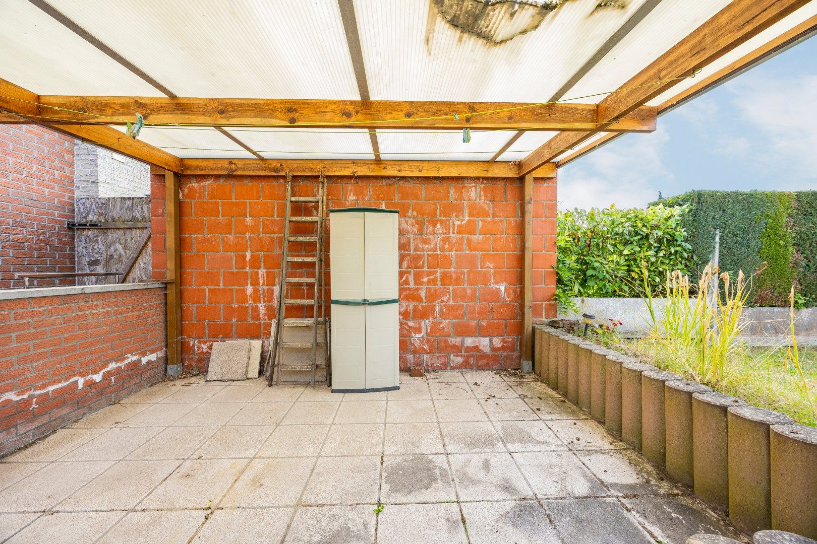 Te renoveren woning met 4 slpks en tuin te Huizingen foto 11