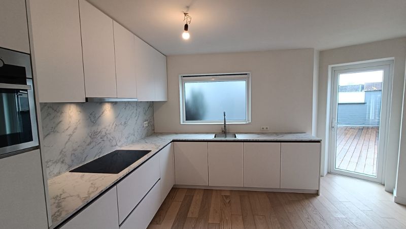 Instapklare bel-etagewoning met terras, garage en kwaliteitsvol afgewerkt foto 6