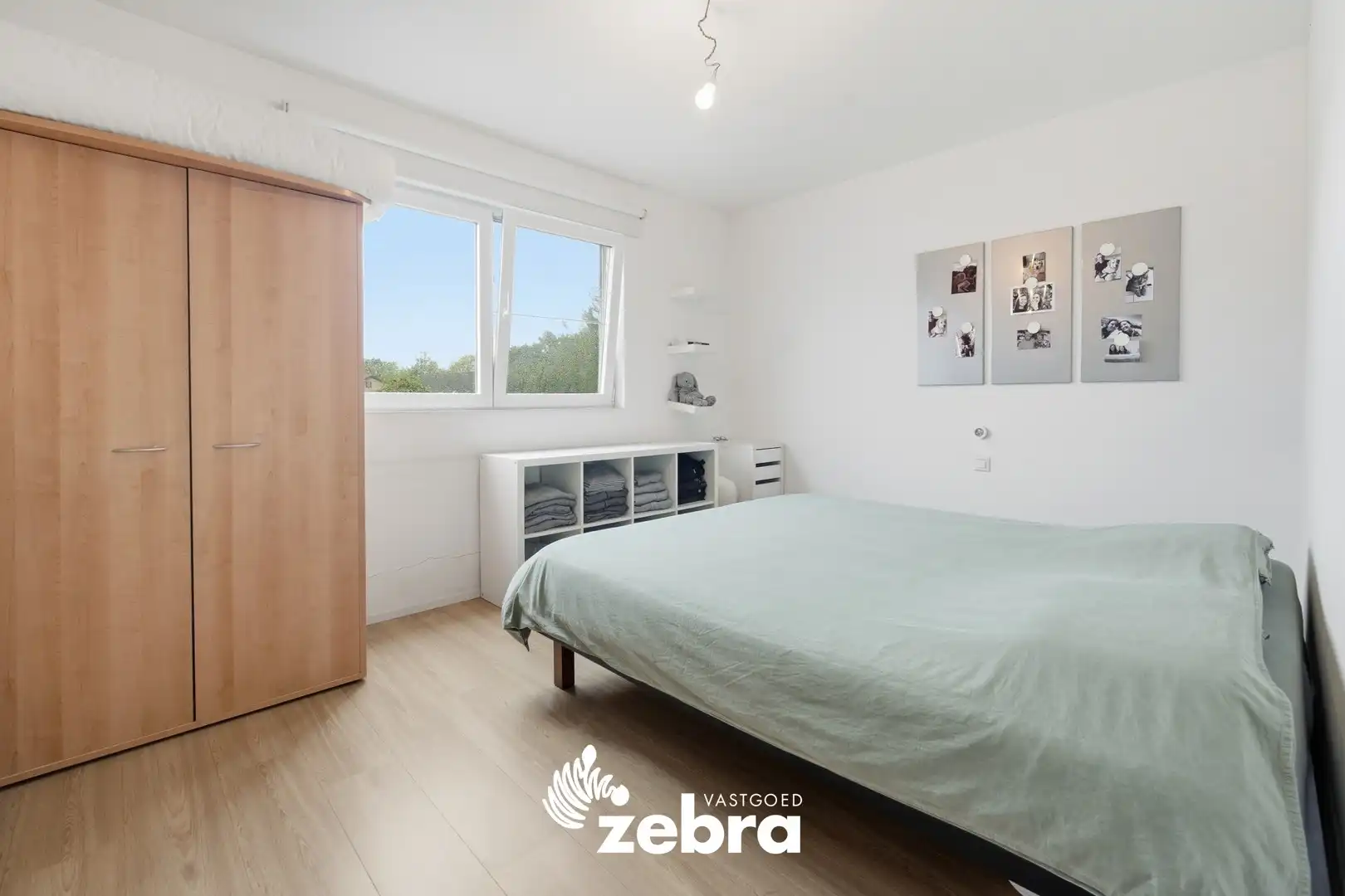 Instapklare woning met achterliggende garage en uitweg! foto 8