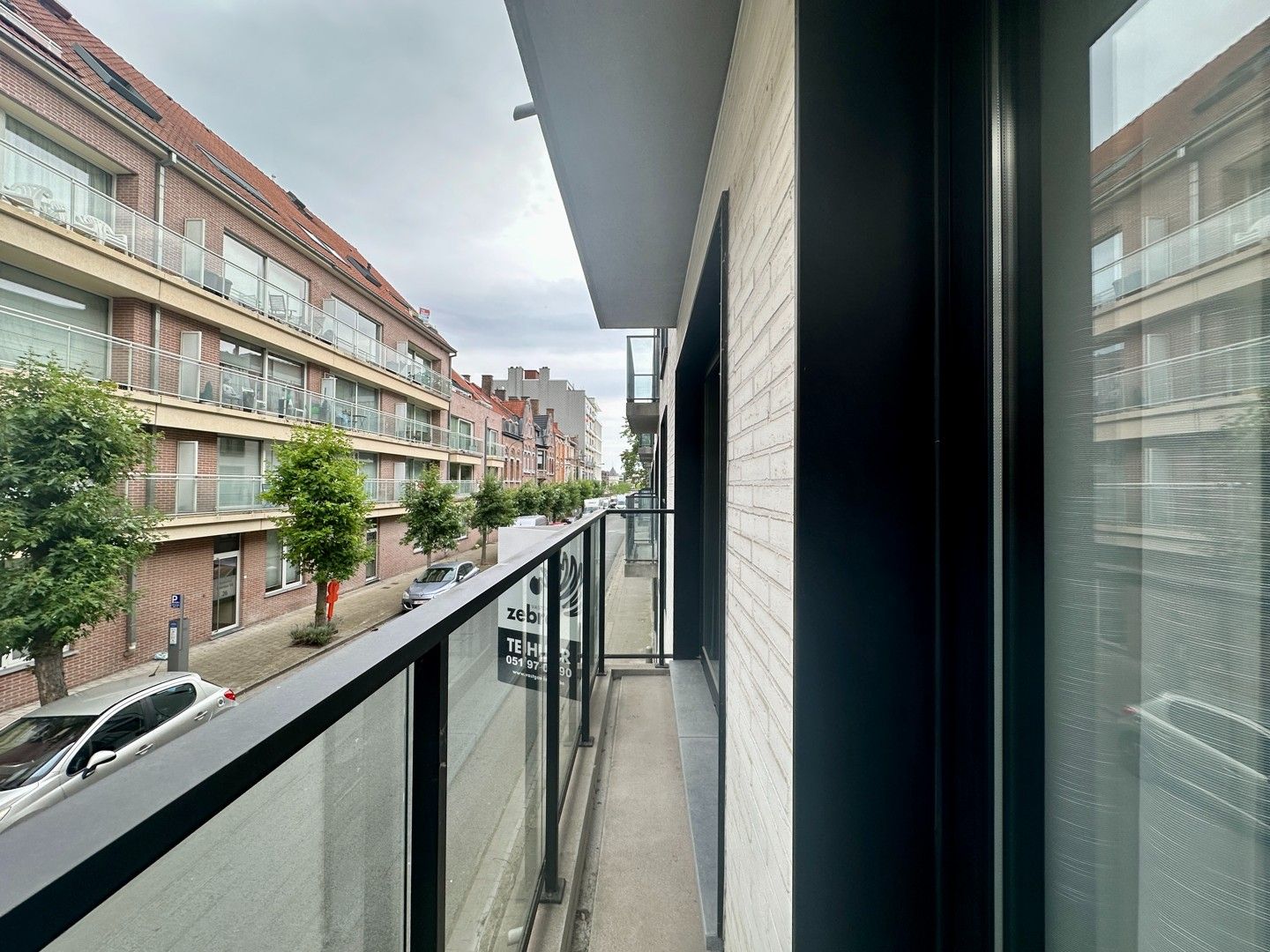 Instapklaar appartement met gezellig terras & parkeerplaats te Kortrijk-centrum! foto 4