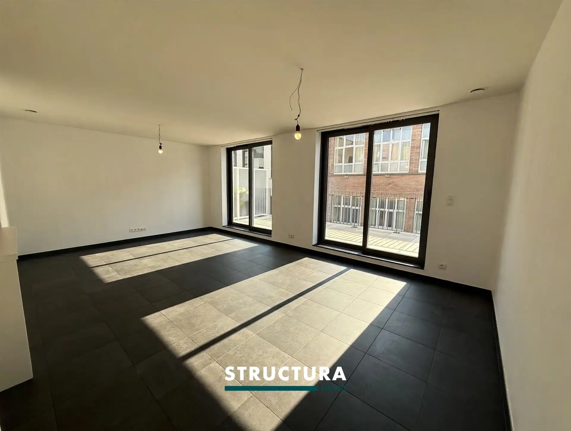 Appartement met ruim terras, staanplaats aan de Markt foto 2