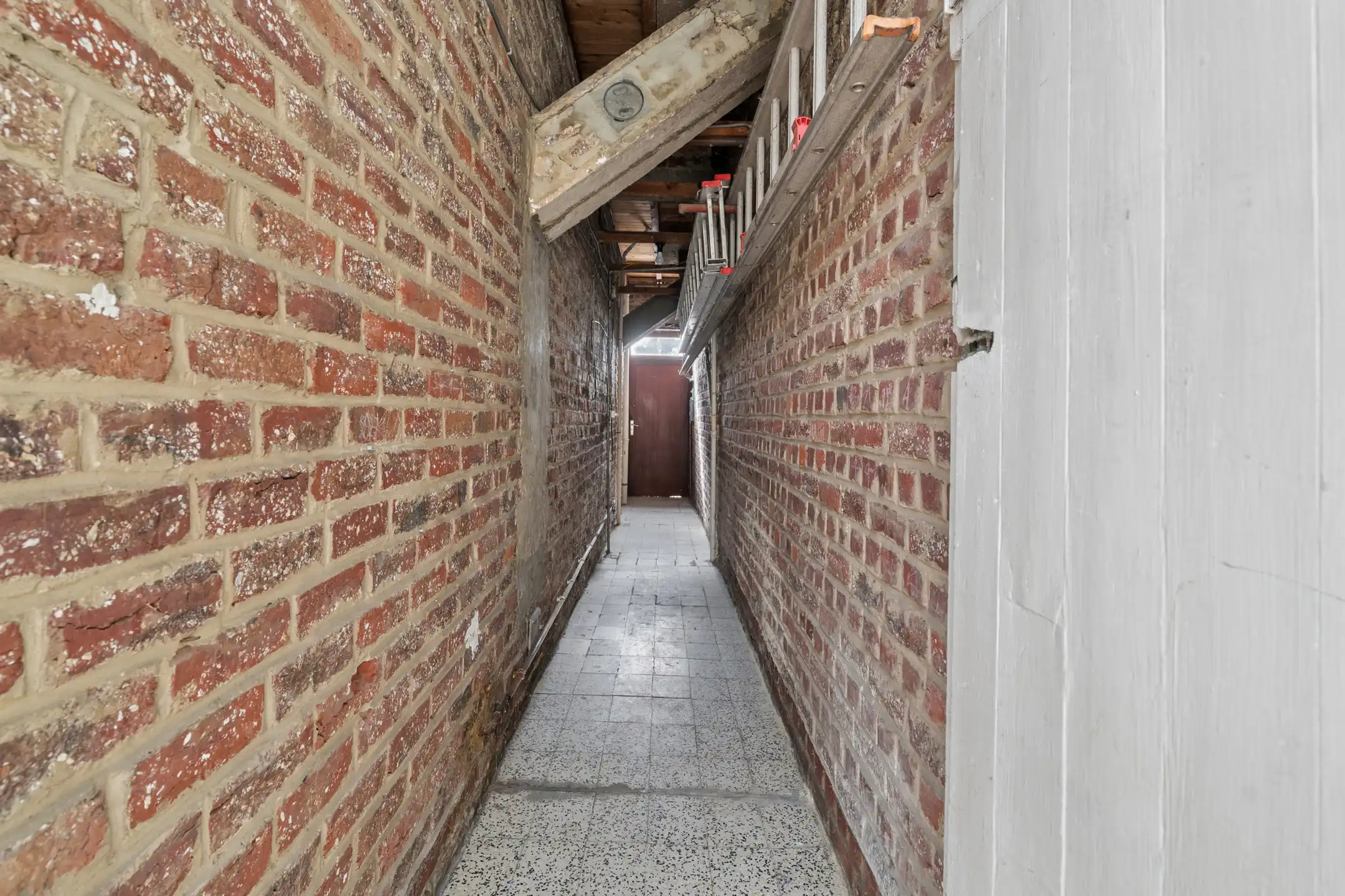 Te renoveren woning met tuin op centrale ligging foto 9