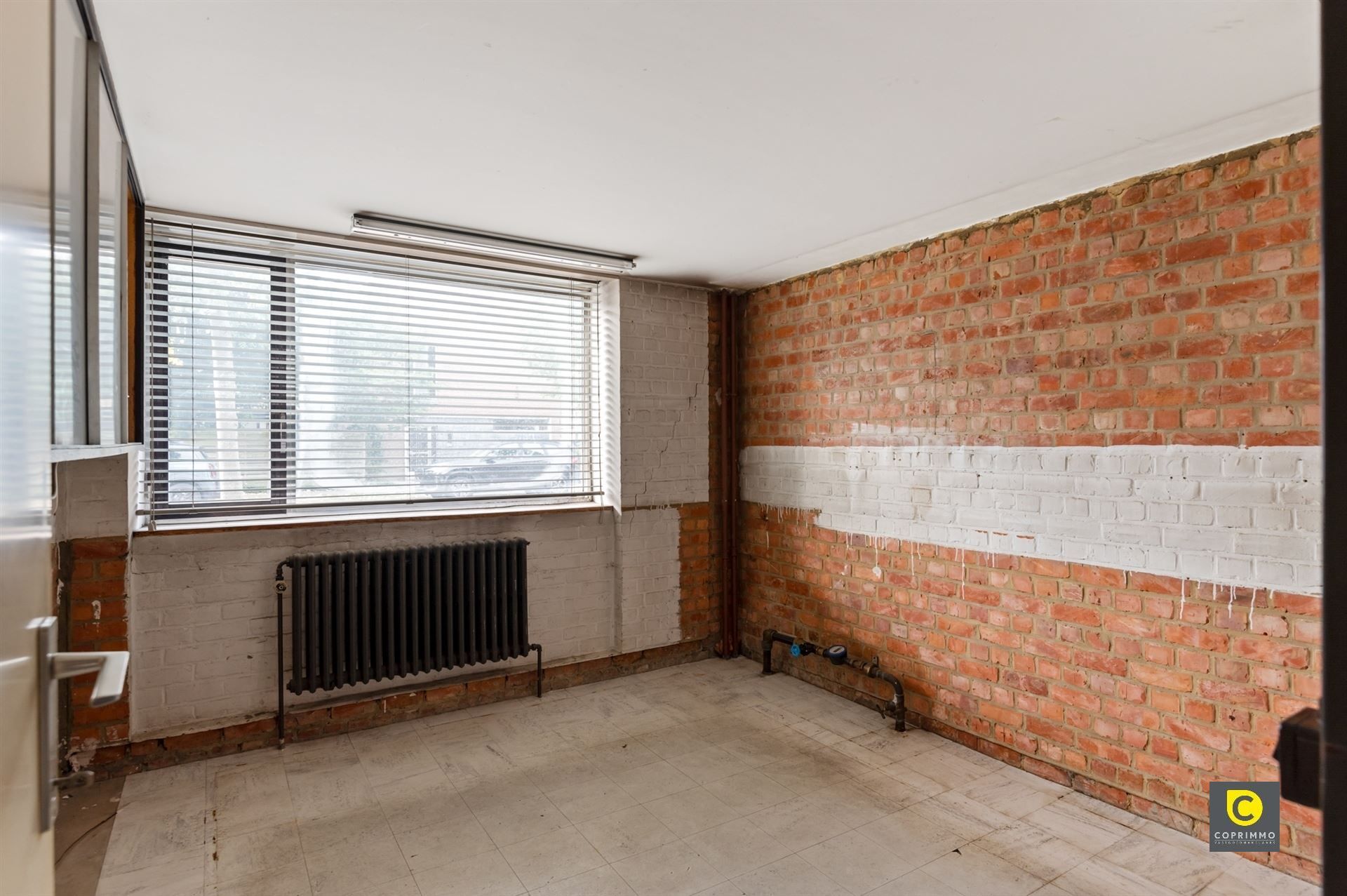 Ruime karakterwoning met tuin in Mortsel foto 5