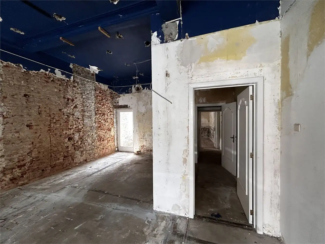 Te renoveren handelshuis met woonst foto 10