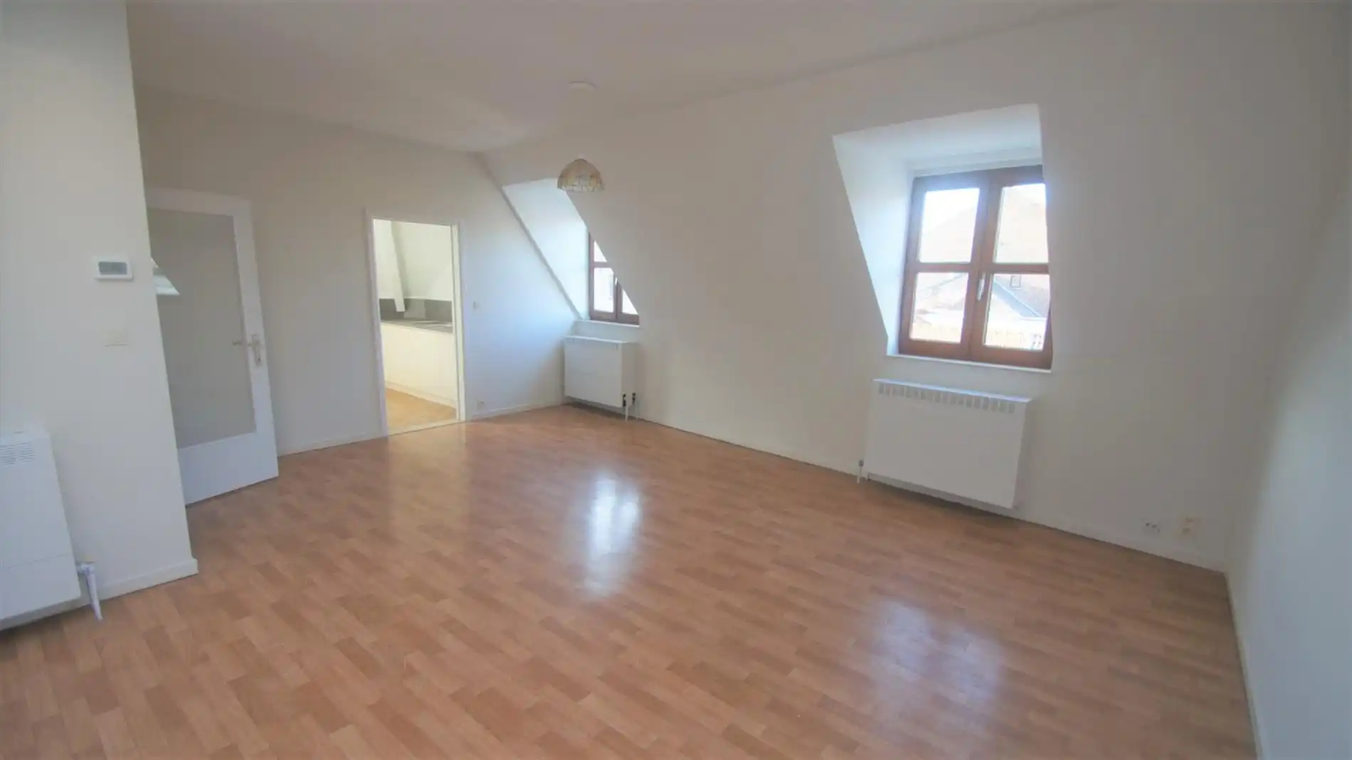Zeer goed gelegen dakappartement met 2 ruime slpks foto 2