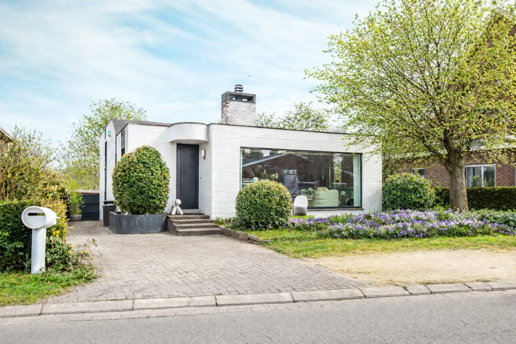 Hoofdfoto van de publicatie: Vrijstaande woning op 1.460 m² in het groen te Heffen