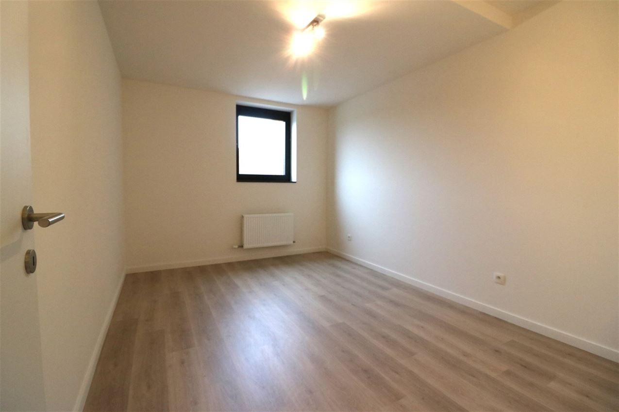 Gelijkvloers appartement met 2 slpk., terras en autostaanplaats foto 15
