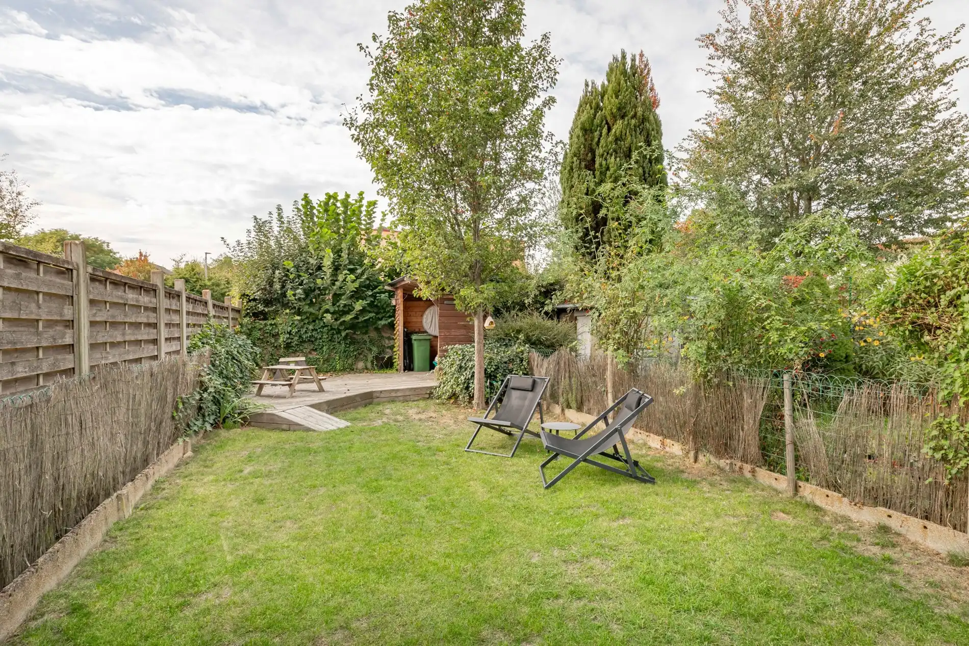 Knap ingerichte woning met heerlijke tuin! foto 3
