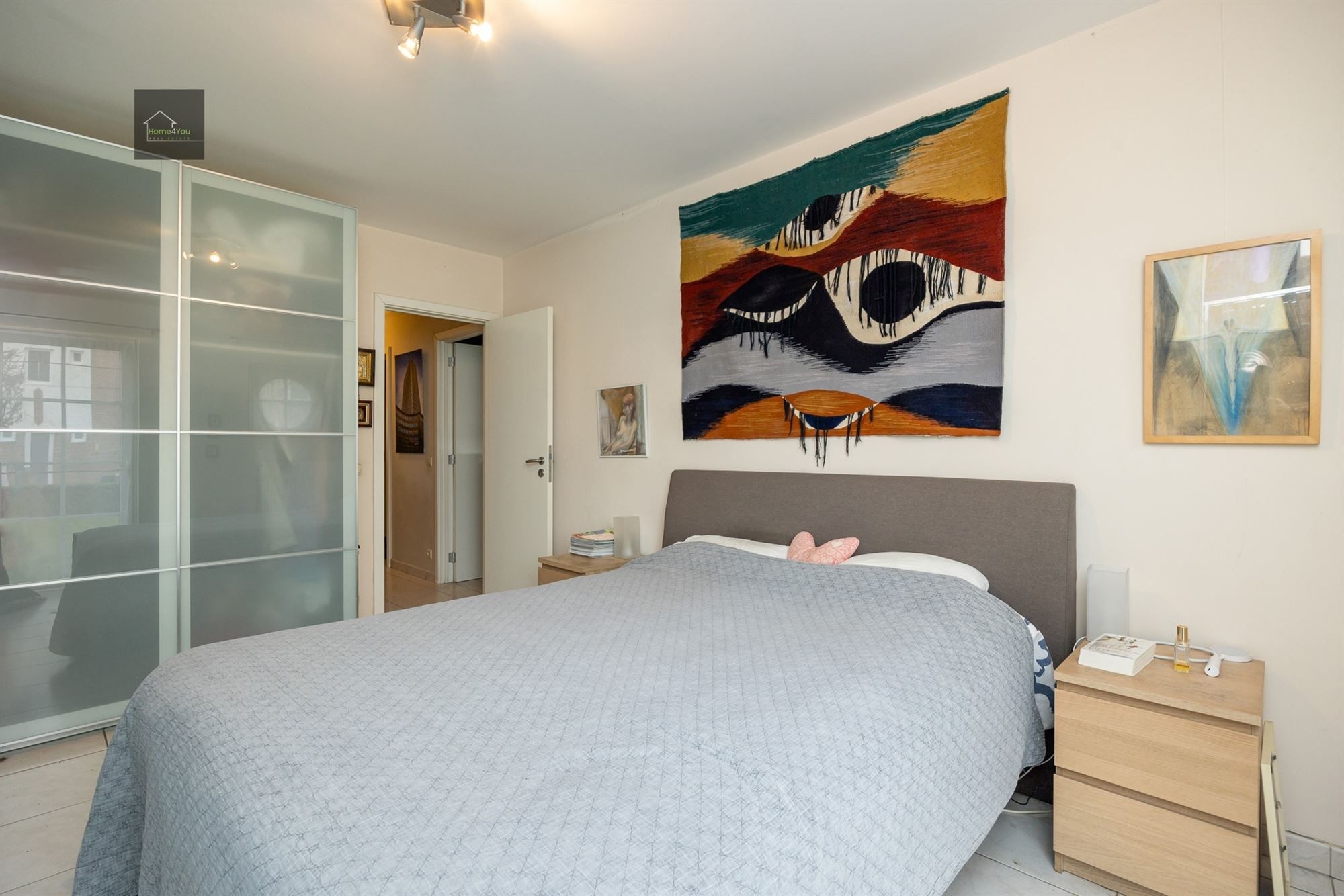 Ruim gelijkvloers appartement met tuin, parking en garagebox foto 11