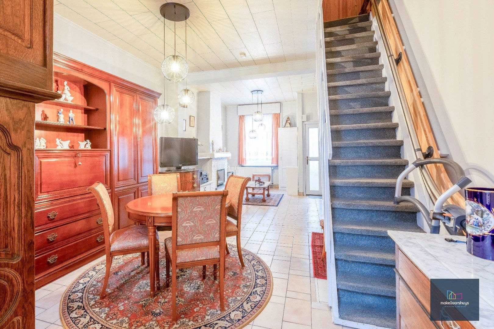 Charmante op te frissen rijwoning met ruime stadstuin  foto 5