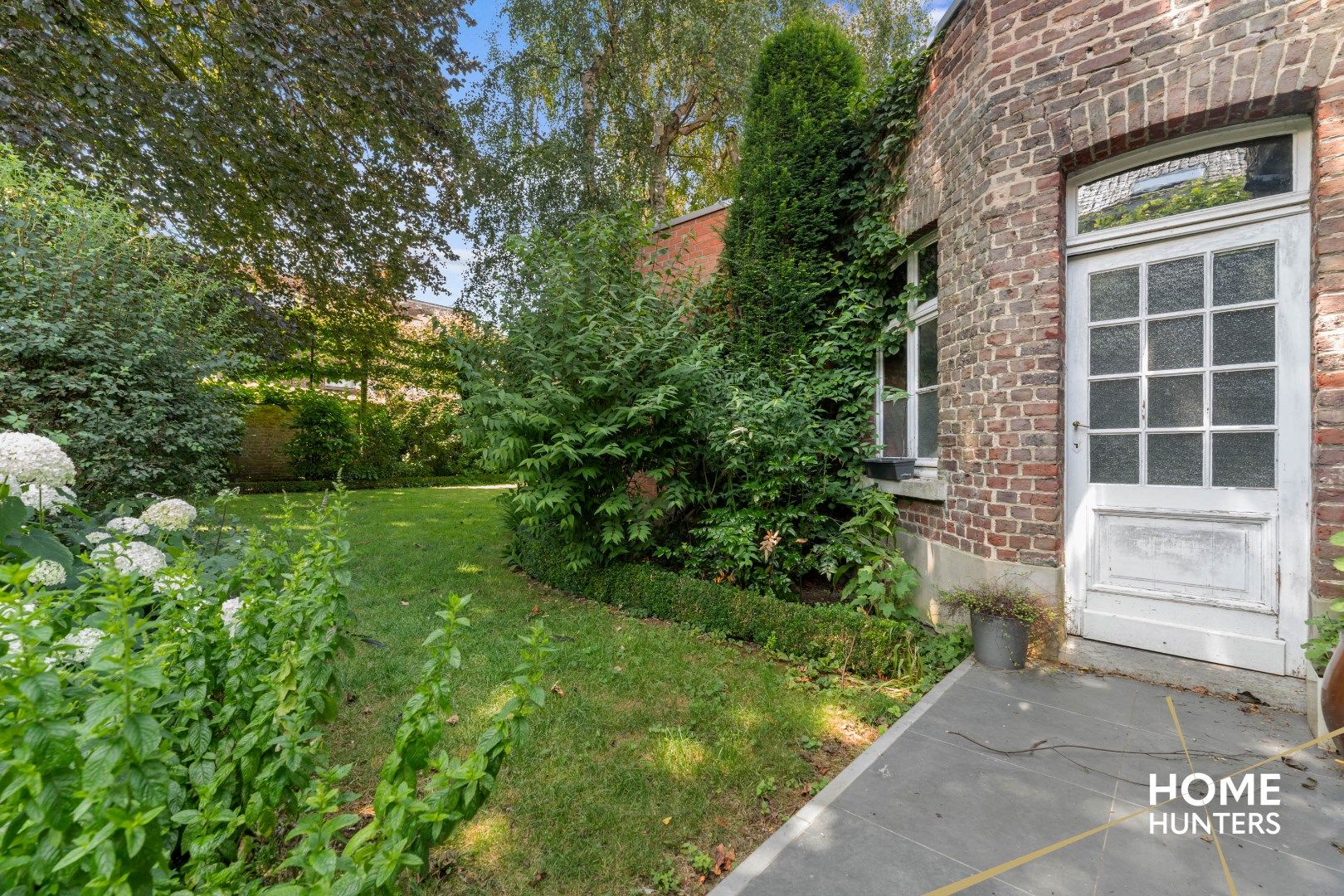 Statige herenwoning met 8 slaapkamers, ruime garage, praktijkruimte en fenomenale stadstuin foto 39