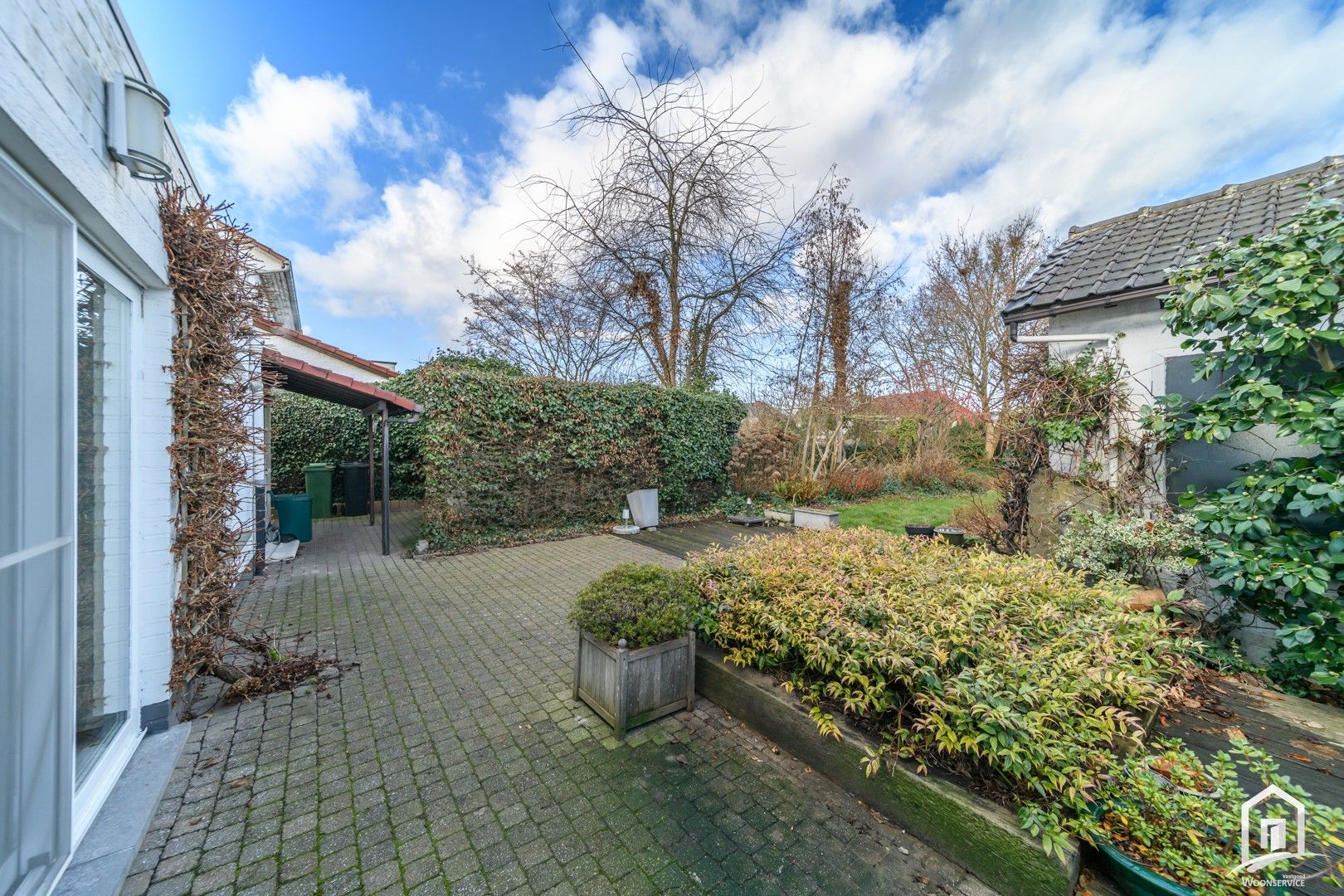 Instapklare halfopen bebouwing met tuin en garages in Denderleeuw foto 16