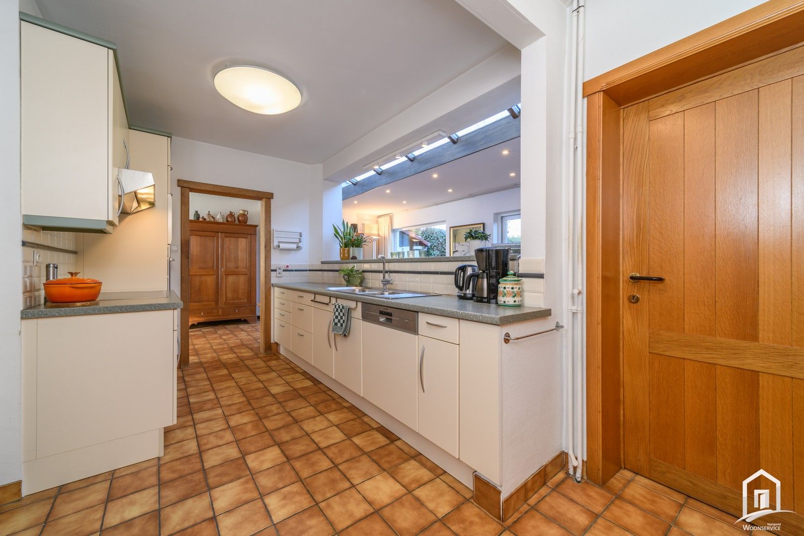 Instapklare halfopen bebouwing met tuin en garages in Denderleeuw foto 11