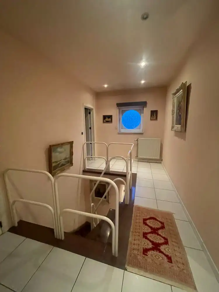 Gunstig gelegen woning met groot terras/tuin + een inpandige én een aparte garage foto 21