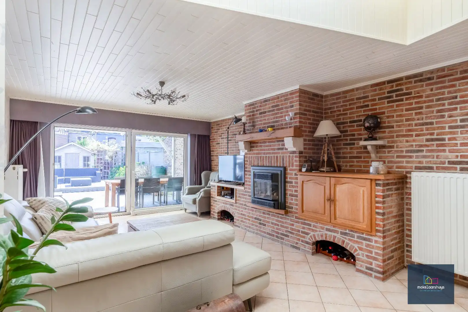 Goed onderhouden en ruime woning in rij met tuin/terras te Wondelgem foto 3