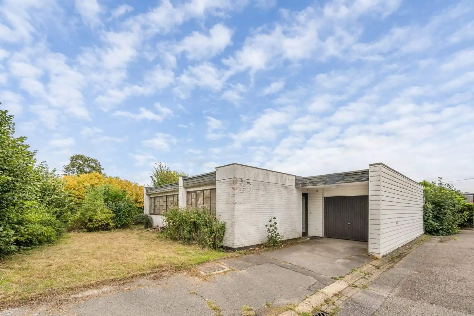 Karaktervolle patio-bungalow met renovatiepotentieel in doodlopende straat te Herent foto 4