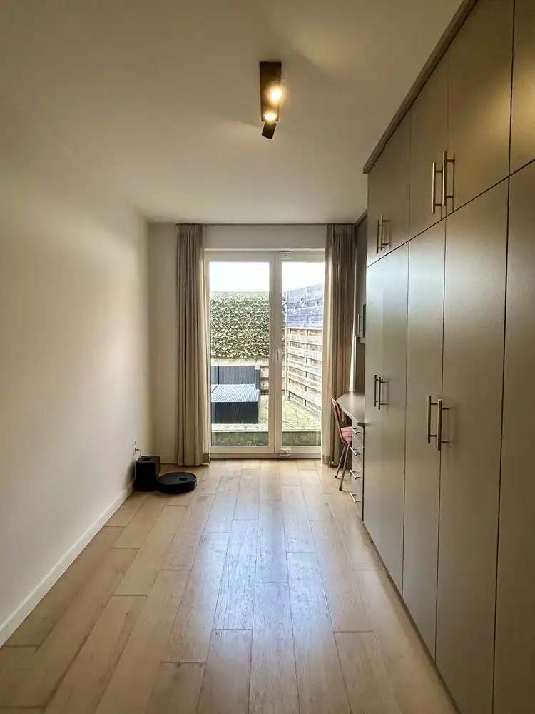 Instapklaar gelijkvloers appartement met privatieve tuin en garage in hartje Kessel-Lo foto 16