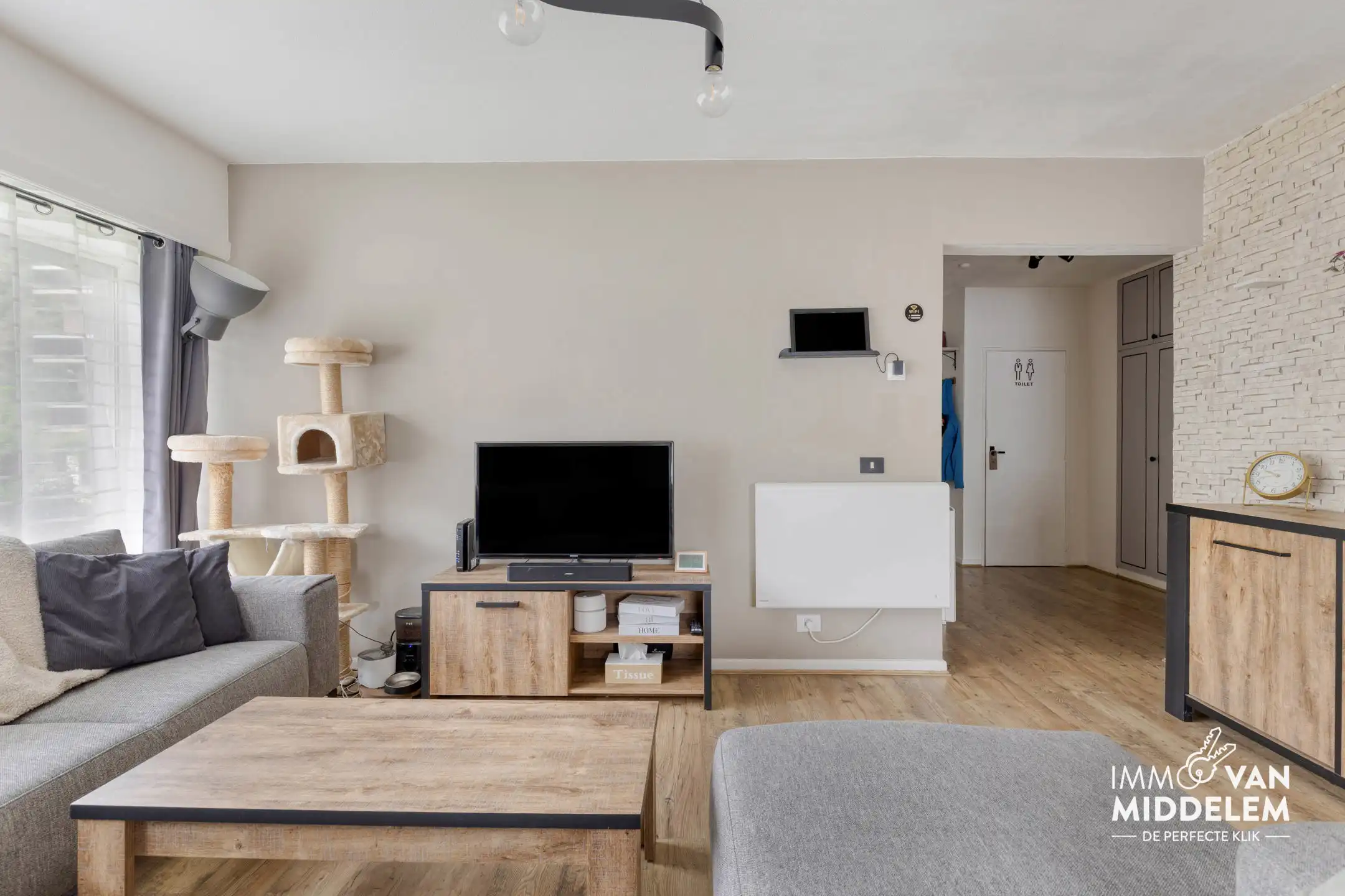 GELIJKVLOERS APPARTEMENT MET 2 KAMERS, TUIN EN GARAGE foto 3