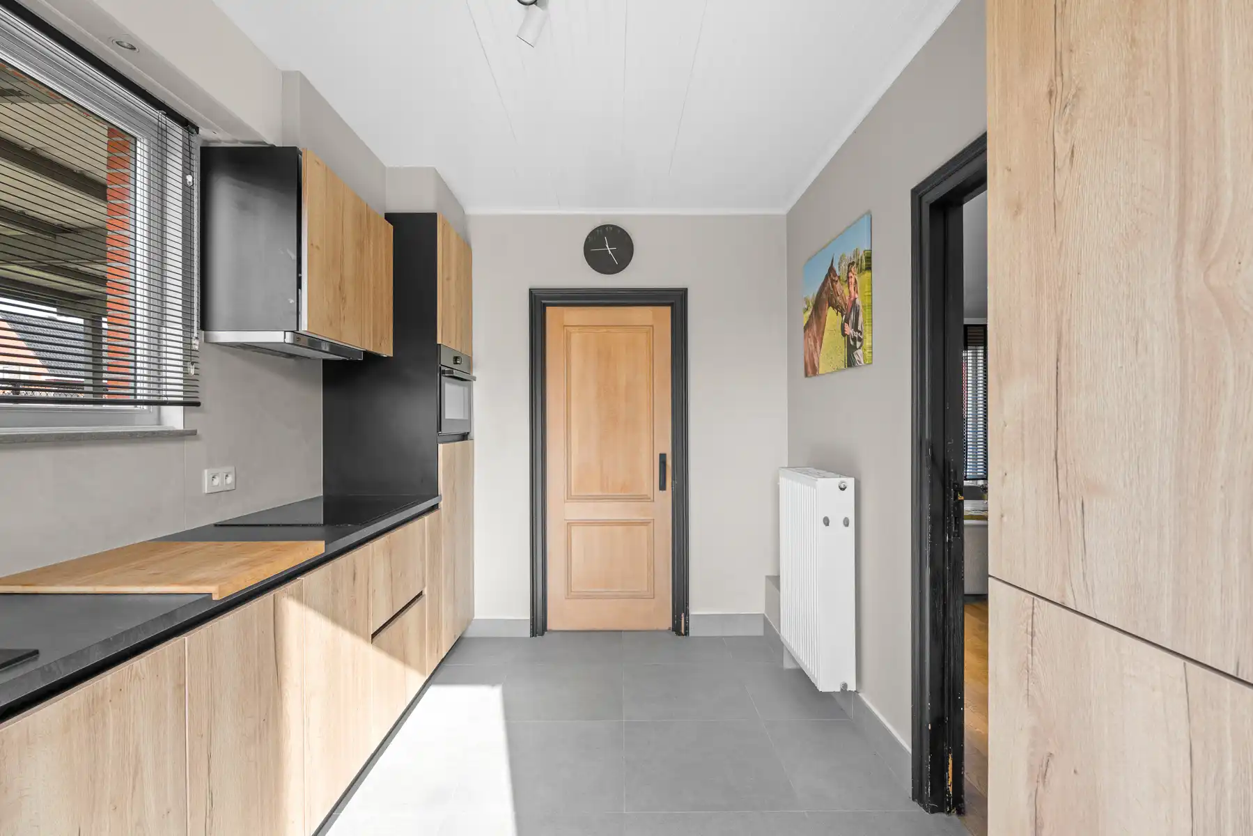 Instapklare halfopen bebouwing met zonnige tuin nabij centrum Lokeren foto 7