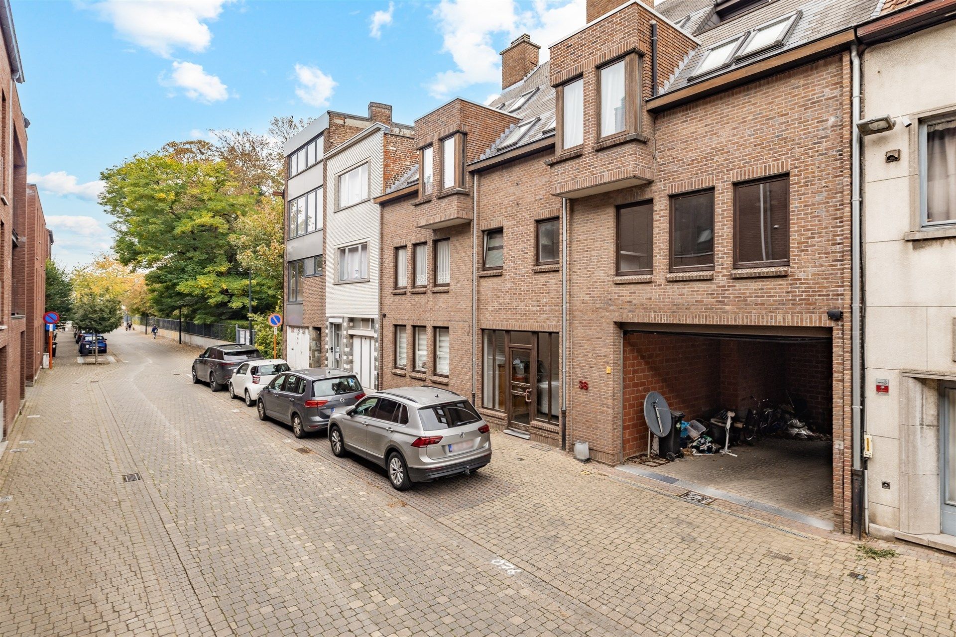 Opbrengsteigendom bestaande uit 4 appartementen + 22 garageboxen + magazijn/werkplaats foto 26