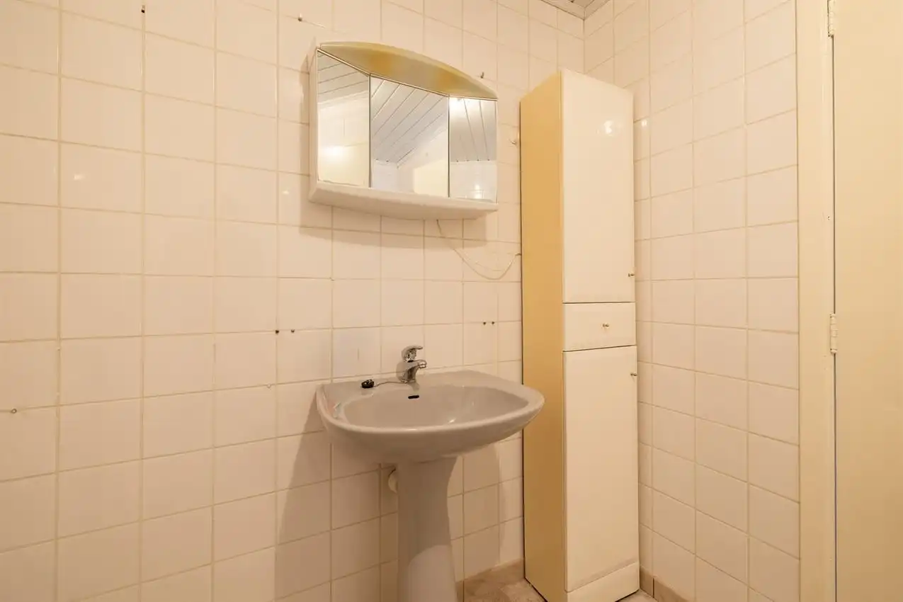 Verzorgde woning met 2 slpk., tuin en garage foto 22