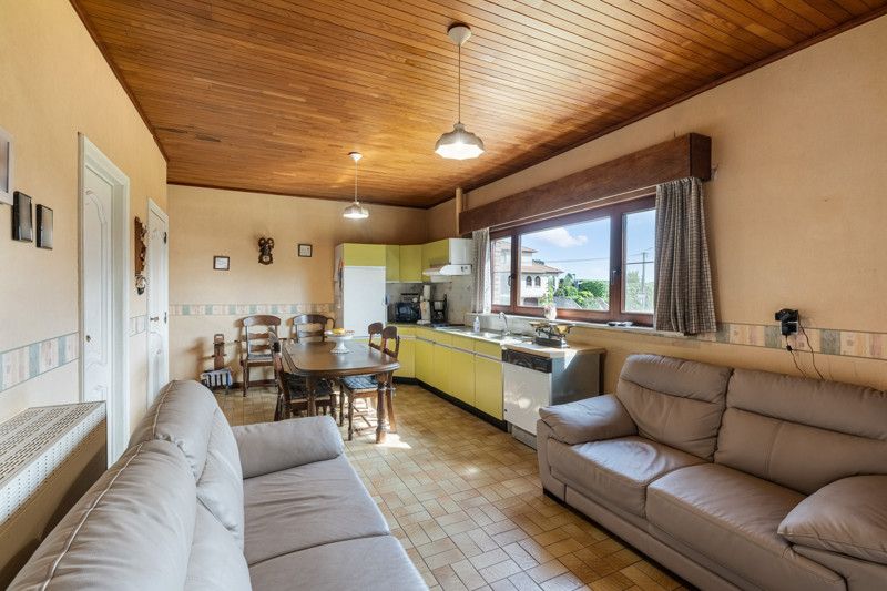 Gelijkvloerse woning met grote loods achteraan op 25are foto 13