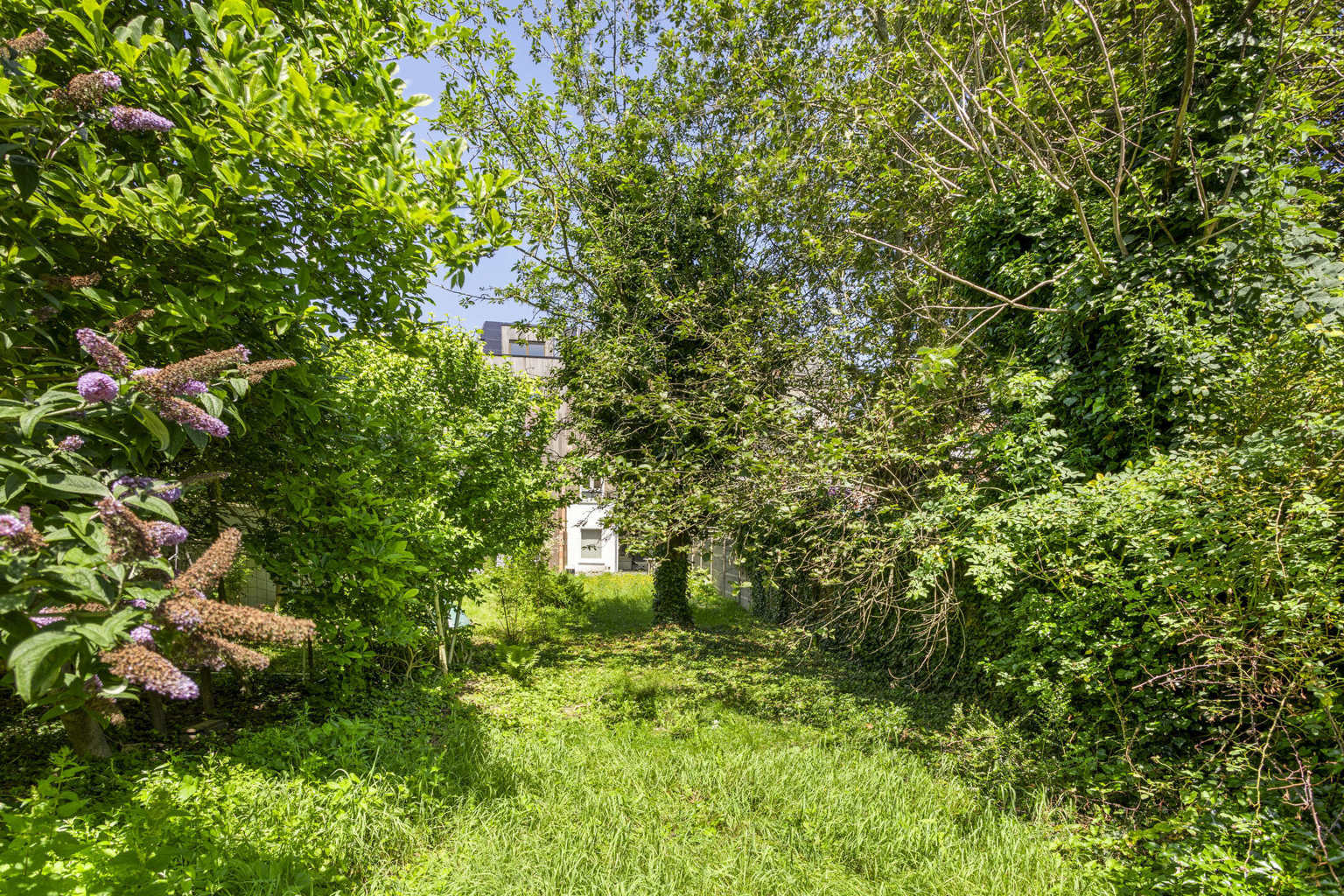 Karaktervolle, mooie ruime rijwoning met tuin   foto 20