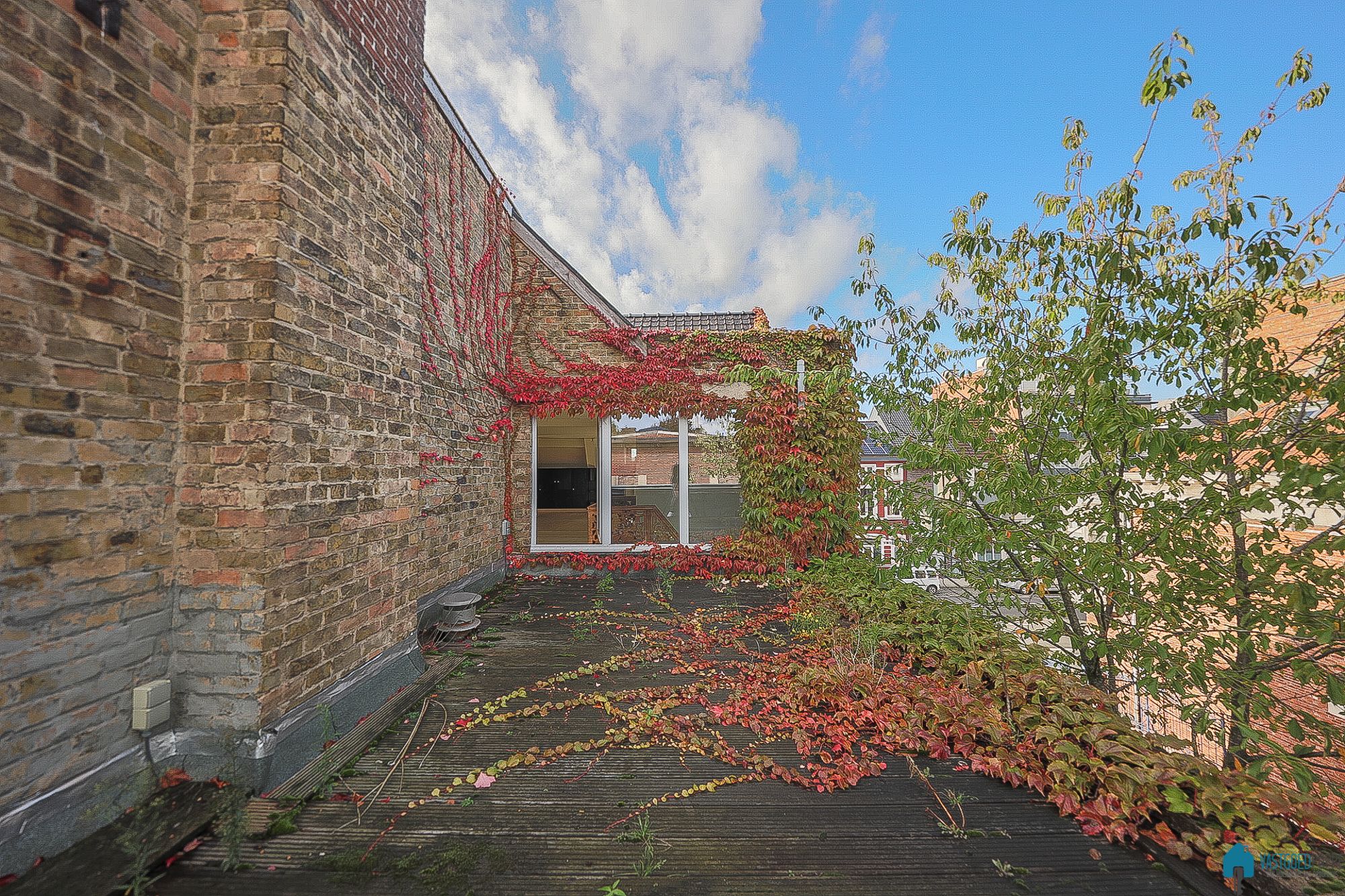 Karaktervolle stadsvilla met praktijkruimte en tuin foto 28